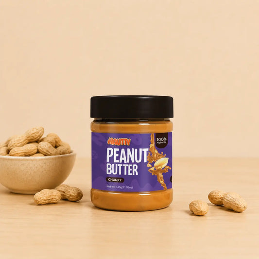 Nautty Creamy Peanut Butter 340g jar with roasted peanuts in Pakistan